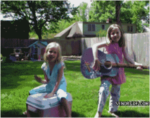 kid-power-wheels-plows-through-girls-singing.gif