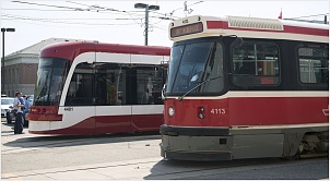 new_and_old_streetcars_of_toronto.jpg