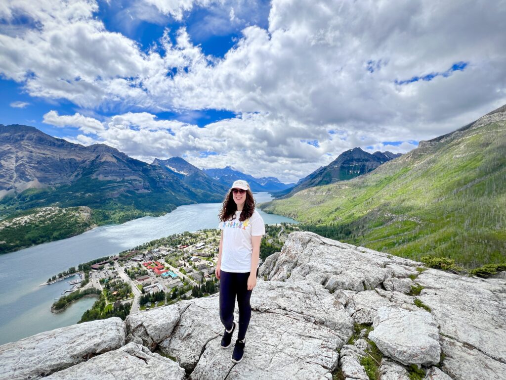 10 things I’ve learned after a year of living in Canada: the author in nature - on top of a mountain with Waterton Lakes in the background